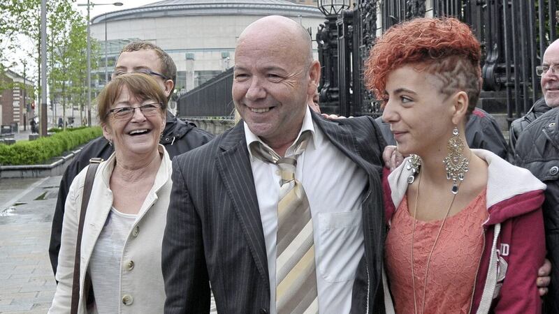 Liam Holden, pictured with loved ones in 2012 following the quashing of his 1972 murder conviction at Belfast High Court. Picture: Pacemaker 