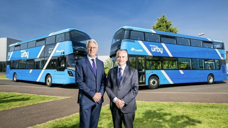 Announcing that Translink is to take delivery of 28 new high specification double deck buses this summer from Wrightbus in Ballymena are Wrights Group chairman Mark Nodder and Chris Conway from Translink. Photo: Brian Morrison 