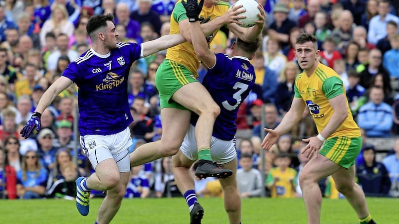 Donegal&#39;s Jason McKee and Cavan&#39;s Conor Rehill and Padraig Faulkner in action during yesterday&#39;s Ulster final at Clones. Picture Philip Walsh. 