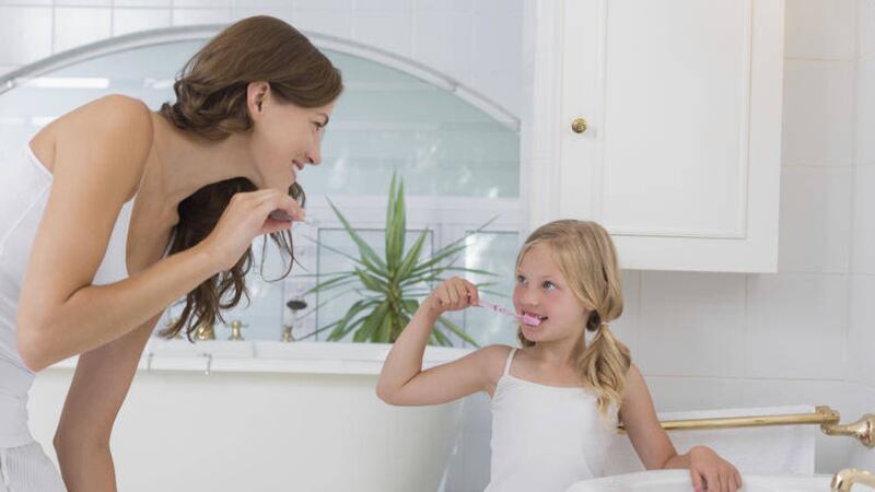 It can take time, patience and imagination to teach a child to brush their teeth properly 