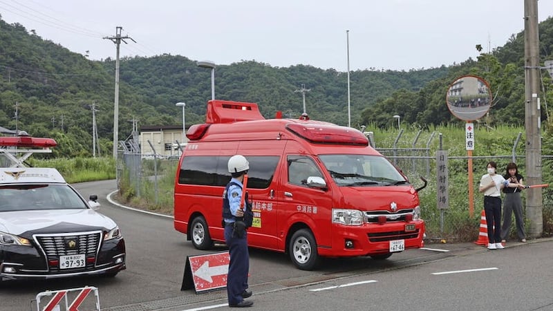 A fire truck leaves the Ground Self Defence Force’s Hino Kihon firing range (Kyodo News/AP)