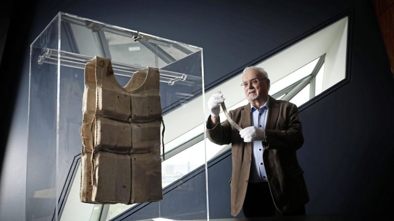 Rodney McCullough, former historian for Harland &amp; Wolff, pictured with a life jacket from the Titanic which has gone on display at Titanic Belfast to commemorate 110th anniversary of the world&#39;s most famous ship. Picture by Kelvin Boyes/PressEye 