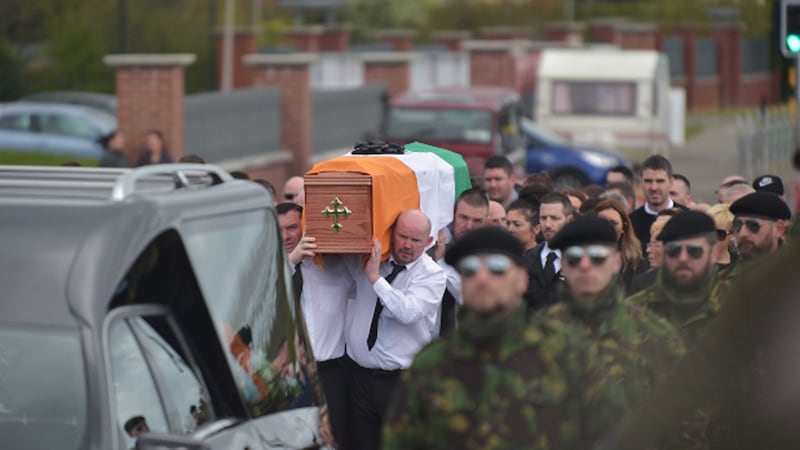 &nbsp;Around a dozen men, dressed in paramilitary-style uniform, accompanied the cortege as it travelled towards the church