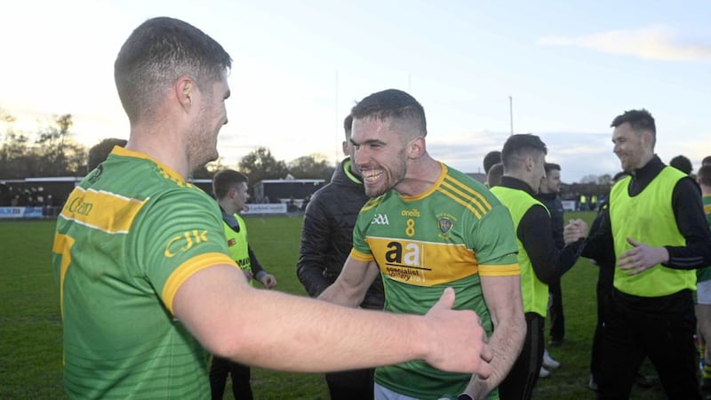 Kevin Small (right) celebrates with Jamie McCann after yesterday&#39;s win over Cargin Picture: Mark Marlow 