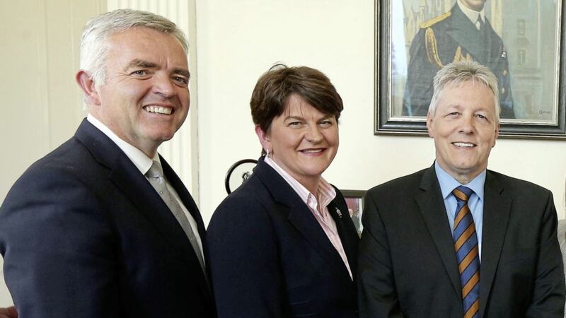 Former DUP minister Jonathan Bell with party leader Arlene Foster and ex-party leader Peter Robinson 