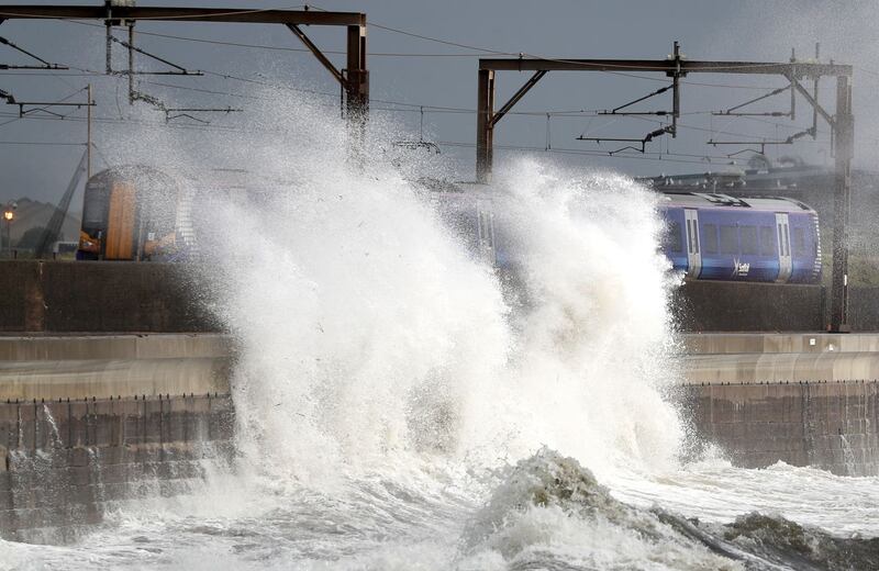 Alas, it was never going to last forever. A train passes in Saltcoats on the west coast of North Ayrshire as Storm Ellen approached later in the month