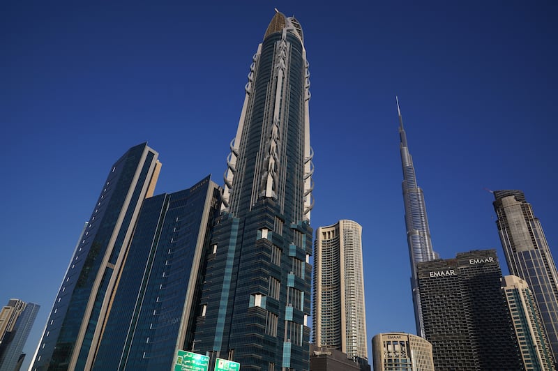 The skyline of Dubai, including Al Hikma Tower and the Burj Khalifa skyscraper, in the United Arab Emirates