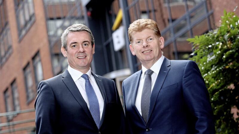EY&#39;s former Belfast office head Mike McKerr (right) takes up a new role as chairperson of EY Ireland in July, when he will be succeeded as the firm&#39;s managing partner by Frank O&rsquo;Keeffe (left) 