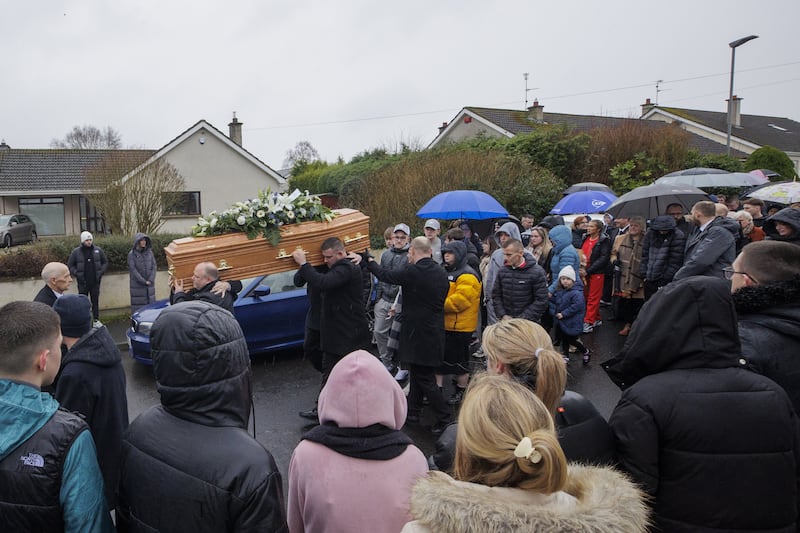 The coffin of Blake Newland is carried out of the home of his grandmother in Limavady