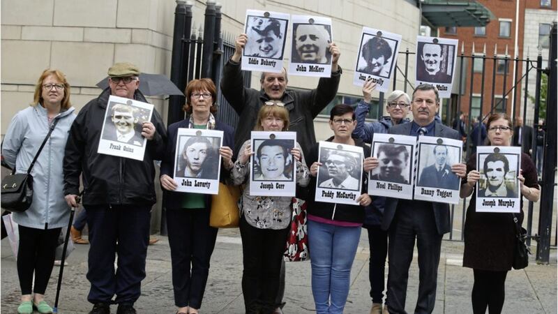 Families of victims of the Ballymurphy massacre outside court in Belfast during a previous hearing. Picture by Hugh Russell