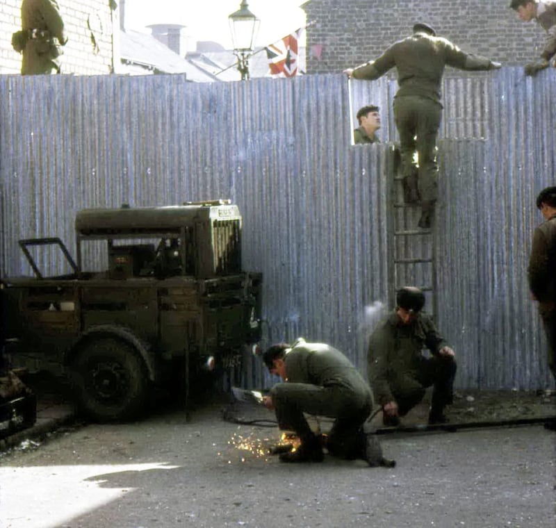 The first peaceline being erected by the British Army in Belfast 1969 