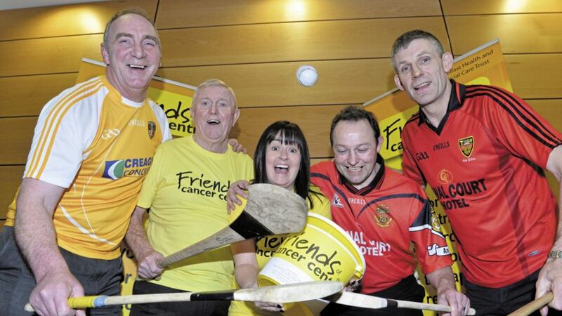 Sean McGuinness (second from left) launching a cancer centre fundraiser several years ago with former Antrim hurler Ger Rogan, Elaine Hogwarth, and ex-Down stars Noel Sands and Danny Hughes.<br /> Picture Mark Marlow.
