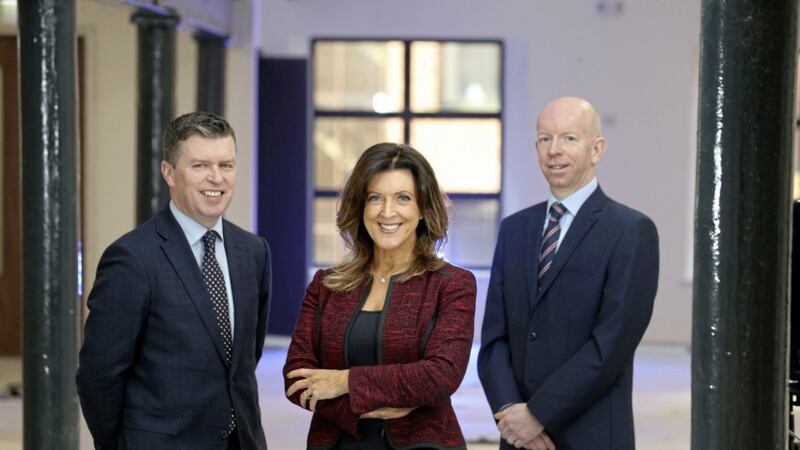 MCS Group managing director Barry Smyth (left) and commercial director Louise Smyth with CBRE director David Wright 