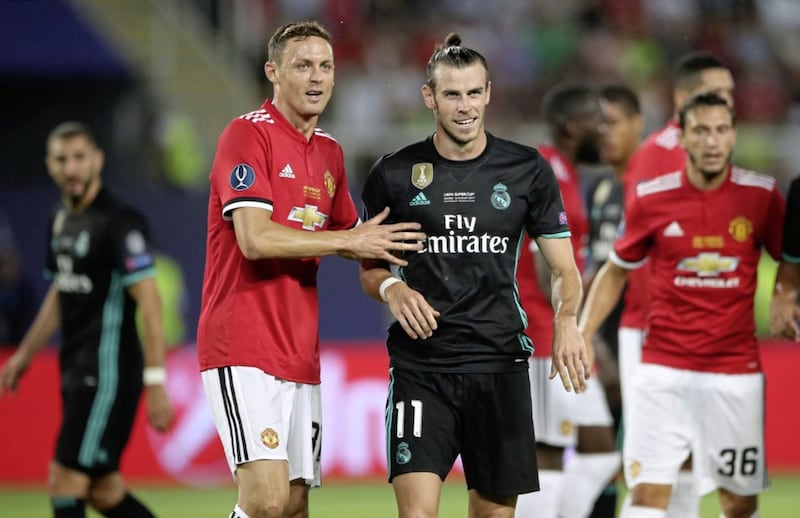 Manchester United&#39;s Nemanja Matic (left) and Real Madrid&#39;s Gareth Bale during the Uefa Super Cup match at the Philip II Arena, Skopje, Macedonia 