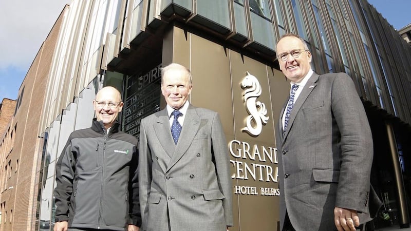 Michael Graham, executive chairman of the Graham Group, at the at the launch of Grand Central Hotel in Belfast with Hastings Group managing director Howard Hastings and its vice-chairman Edward Carson 