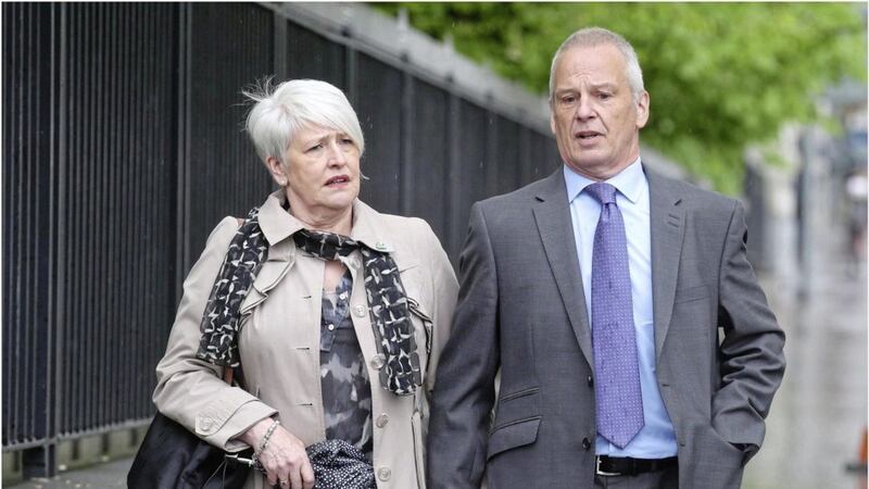 Alan and Jennifer Roberts, the parents of nine-year-old Claire who died in 1996, leave an inquest hearing in Belfast yesterday. Picture by Hugh Russell 