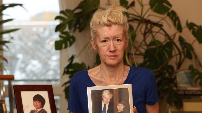 Jasna Badzak with photographs of her murdered son Sven (Jonathan Brady/PA)
