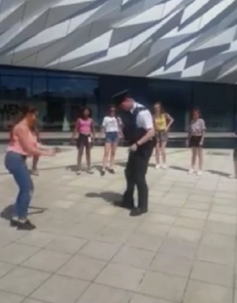 The policeman dancing