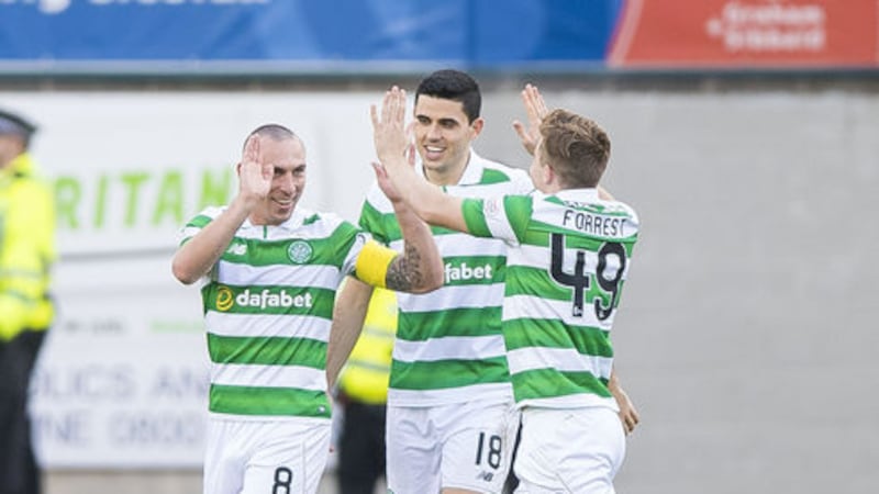 Scott Brown celebrates scoring the winner for Celtic against Dundee at Dens Park on Saturday <br />Picture by PA&nbsp;