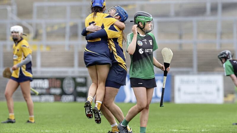 Clonduff captain Jenna Boden and Fionnuala Carr celebrate after beating Eglish in the the Ulster Intermediate Camogie Club Championship final at Pairc Esler Picture: Margaret McLaughlin. 