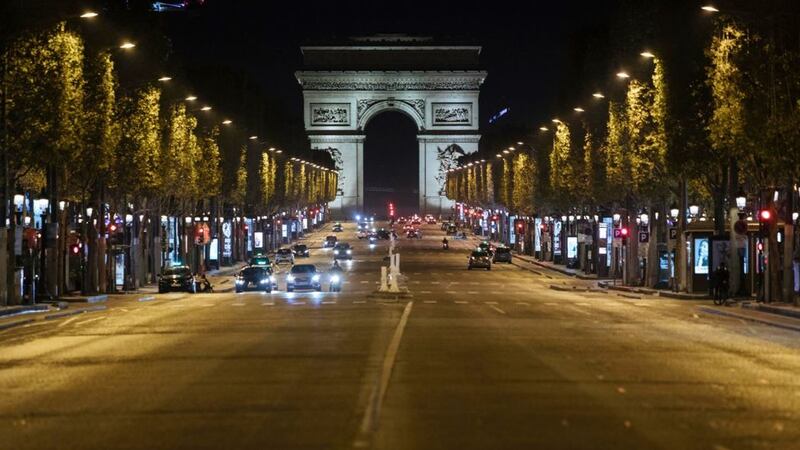 The Champs-Elysees in Paris is practically&nbsp;empty during curfew earlier this month. Picture by Lewis Joly, Associated Press