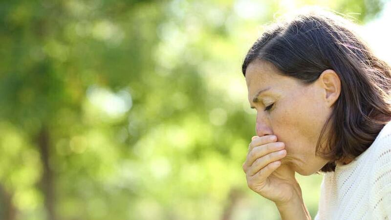 A prolonged cough is an important symptom to look out for (Alamy/PA)