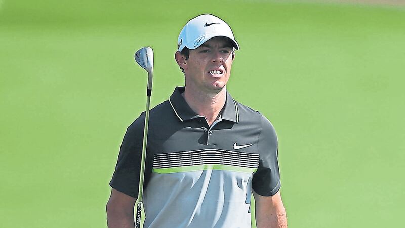 READY TO POUNCE: Rory McIlroy is four shots off the lead after his second successive round of 68 in the DP World Tour Championship yesterday &nbsp; &nbsp;