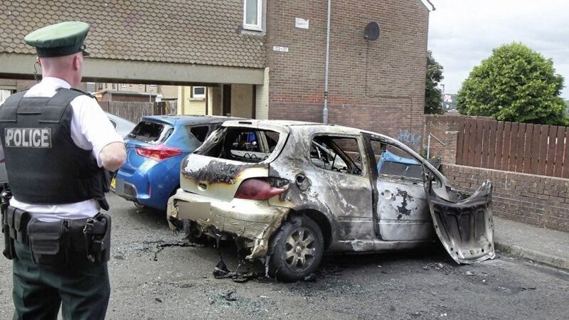 The silver car believed to be involved in Tuesday&#39;s shooting was found burnt out in the near-by loyalist Lincoln Courts area of Derry. Picture by Margaret McLaughlin 