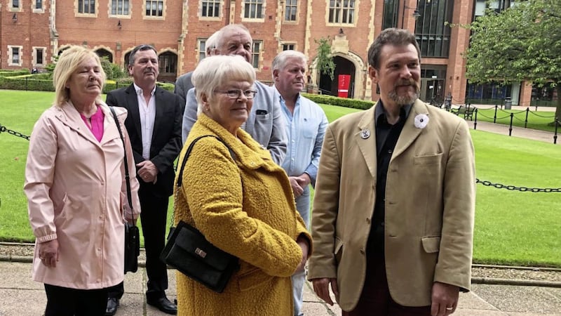 John Teggart, second left, outside Queen&#39;s University Belfast at the meeting of the Raymond McCord Jnr Forum yesterday. Picture by Michael McHugh/PA 