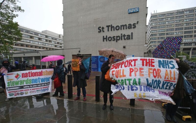 National Shop Stewards Network protesters outside St Thomas' Hospital in London. Picture by Jonathan Brady, Press Association
