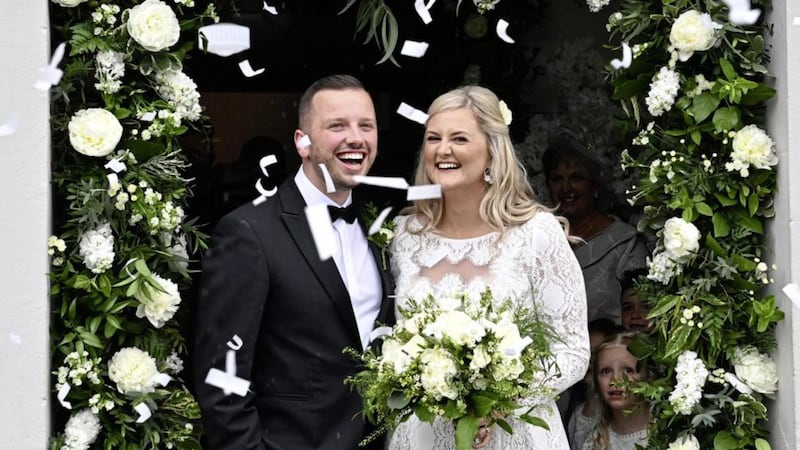 Laura, the daughter of incoming DUP leader Sir Jeffrey Donaldson and Philip, the son of former Ulster Unionist MLA Danny Kennedy, celebrate their wedding in Dromore, Co Down today. Picture by Colm Lenaghan/Pacemaker