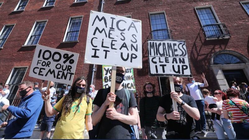 Protesters during a demonstration outside the Government Buildings in Dublin on June 14 2021 to demand a 100% redress scheme for homes and properties affected by bricks contaminated with mica. Picture by Niall Carson/PA Wire