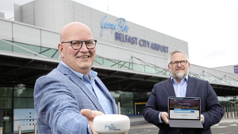 Dave Vincent (left), chief digital officer at Tourism NI, joins Belfast City Airport&rsquo;s director of information technology Brian Roche to launch the airport&rsquo;s digital transformation programme. Picture: Darren Kidd/PressEye 