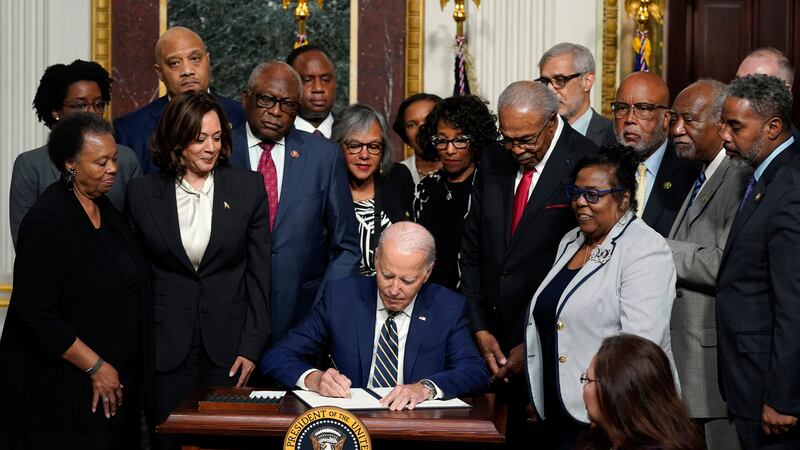 US President Joe Biden signs a proclamation to establish the Emmett Till and Mamie Till-Mobley National Monument, in the Indian Treaty Room at the White House (Evan Vucci/AP/PA)