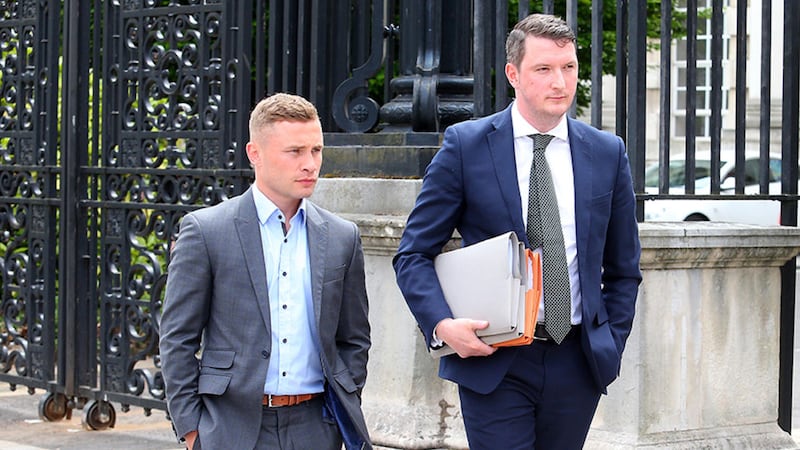 Belfast Boxer Carl Frampton attends Belfast High Court with his solicitor John Finucane. Picture: Mal McCann&nbsp;