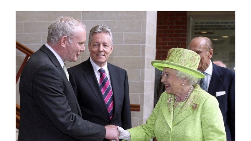 The historic moment when the Queen shook hands with Martin McGuinness during a state visit in 2012. Picture by Paul Faith 