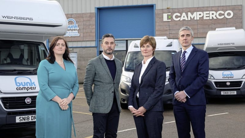 Camperco founders Keith Charlton and Louise Corken (centre) pictured at the group&rsquo;s headquarters in Carryduff with Grant Thornton&rsquo;s Lorraine Nelson and Peter Legge 