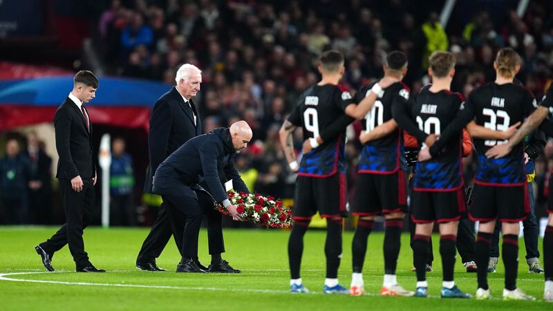 Manchester United manager Erik ten Hag (centre) lays a wreath in tribute to Sir Bobby Charlton (Nick Potts/PA)