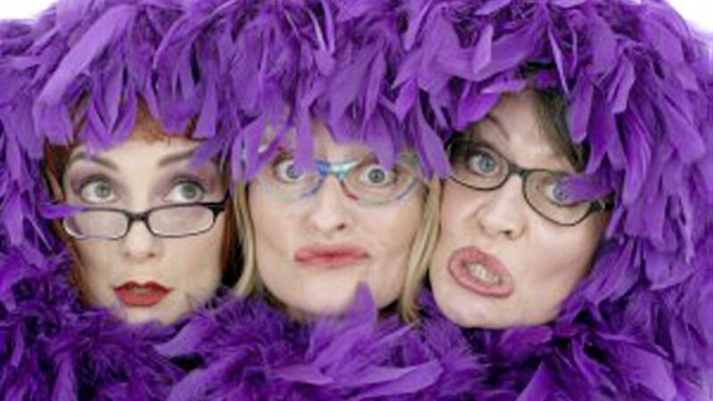 The Nualas with their trademark purple wigs 