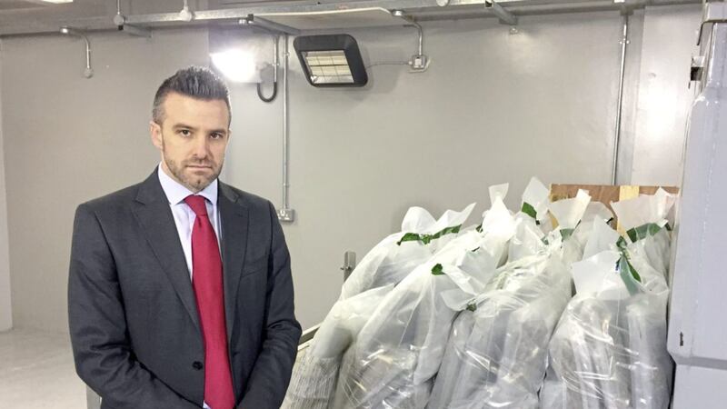 PSNI detective superintendent Bobby Singleton standing next to seized bags of herbal cannabis that are worth &pound;1.3 million 