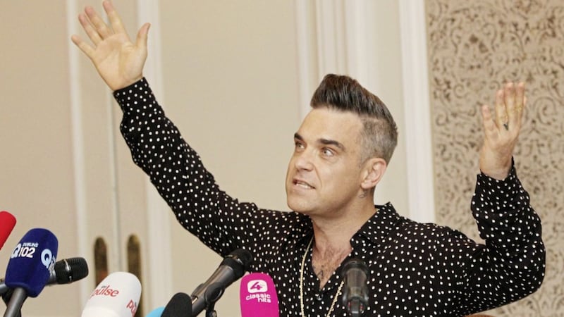 Robbie Williams, his wife Ayda Field and their four children have decamped from LA to Switzerland 
