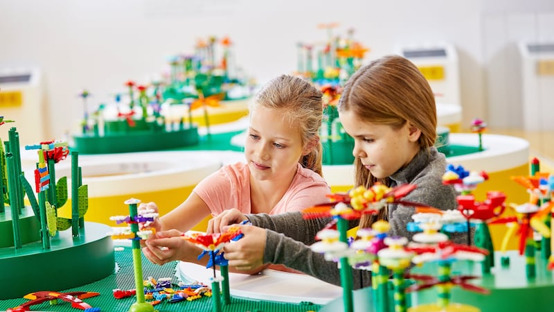 Lego said that after more than two years of testing, it found the new material did not reduce carbon emissions (Lego/PA)