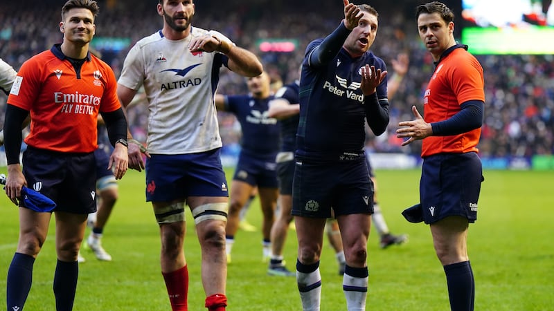 Finn Russell pleads with the officials over Scotland’s disallowed late try
