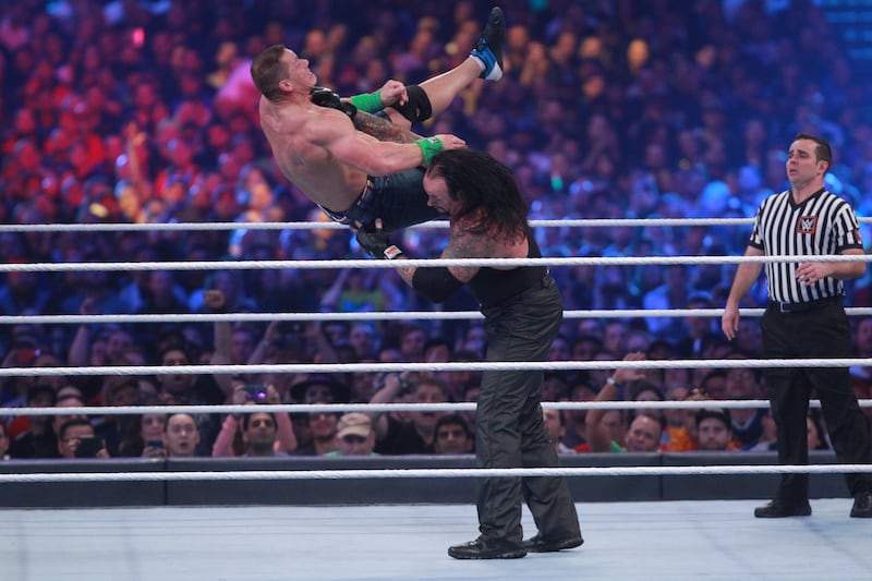 Cena being thrown by the Undertaker