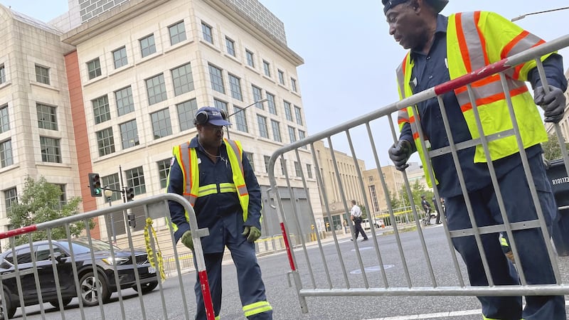 Workers placed barricades around the area of the courthouse ahead of the former president’s arrival (AP Photo/Pablo Martinez Monsivais)