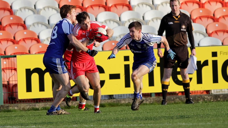 &nbsp;<strong>CLOSE ENCOUNTER:&nbsp;</strong>Derry&rsquo;s Benny Heron (left) is challenged by Monaghan&rsquo;s Kieran Duffy and Karl O&rsquo;Connell during the Dr McKenna Cup semi-final at the Athletic Grounds yesterday. Pictures by Colm O&rsquo;Reilly
