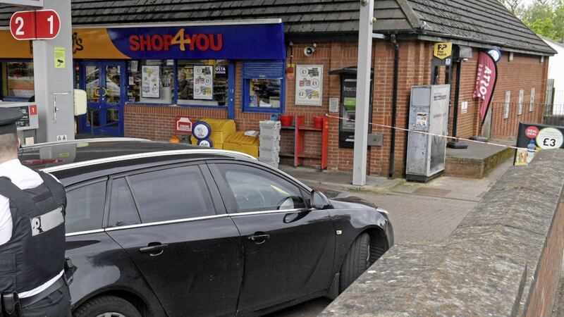 Police at the scene of an attempted ATM theft at a Topaz filling station on the Gilnahirk Road in Belfast in May 
