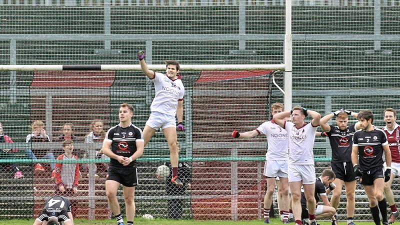 Slaughtneil&rsquo;s Karl McKaigue celebrates on the final whistle after yesterday&rsquo;s victory over Kilcoo in the AIB Ulster Club Senior Football Championship first round match at Pairc Esler, Newry on Sunday Picture by Margaret McLaughlin 