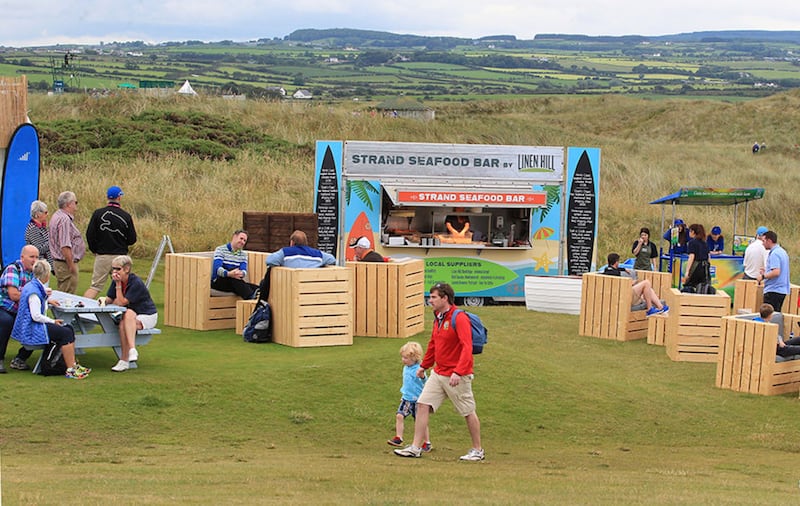 Crowds relaxing on the course during the Dubai Duty Free Irish Open at Portstewart Golf Club on Thursday. Picture Margaret McLaughlin&nbsp;