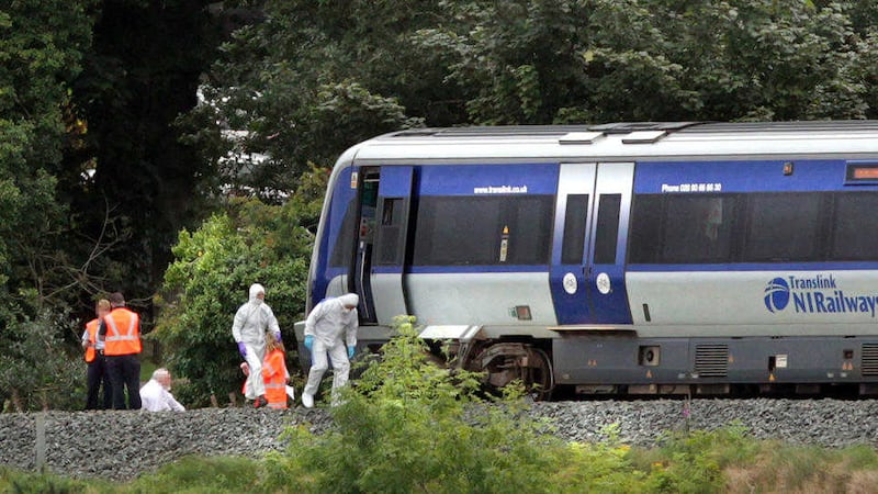 Forensic officers working at the scene of a fatal accident involving a train, a short distance from the main railway station in Derry. Picture by Margaret McLaughlin